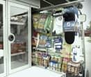 Выдвижная витрина с крючками для рекламной продукции, пакетов с едой и мелких вещей. 